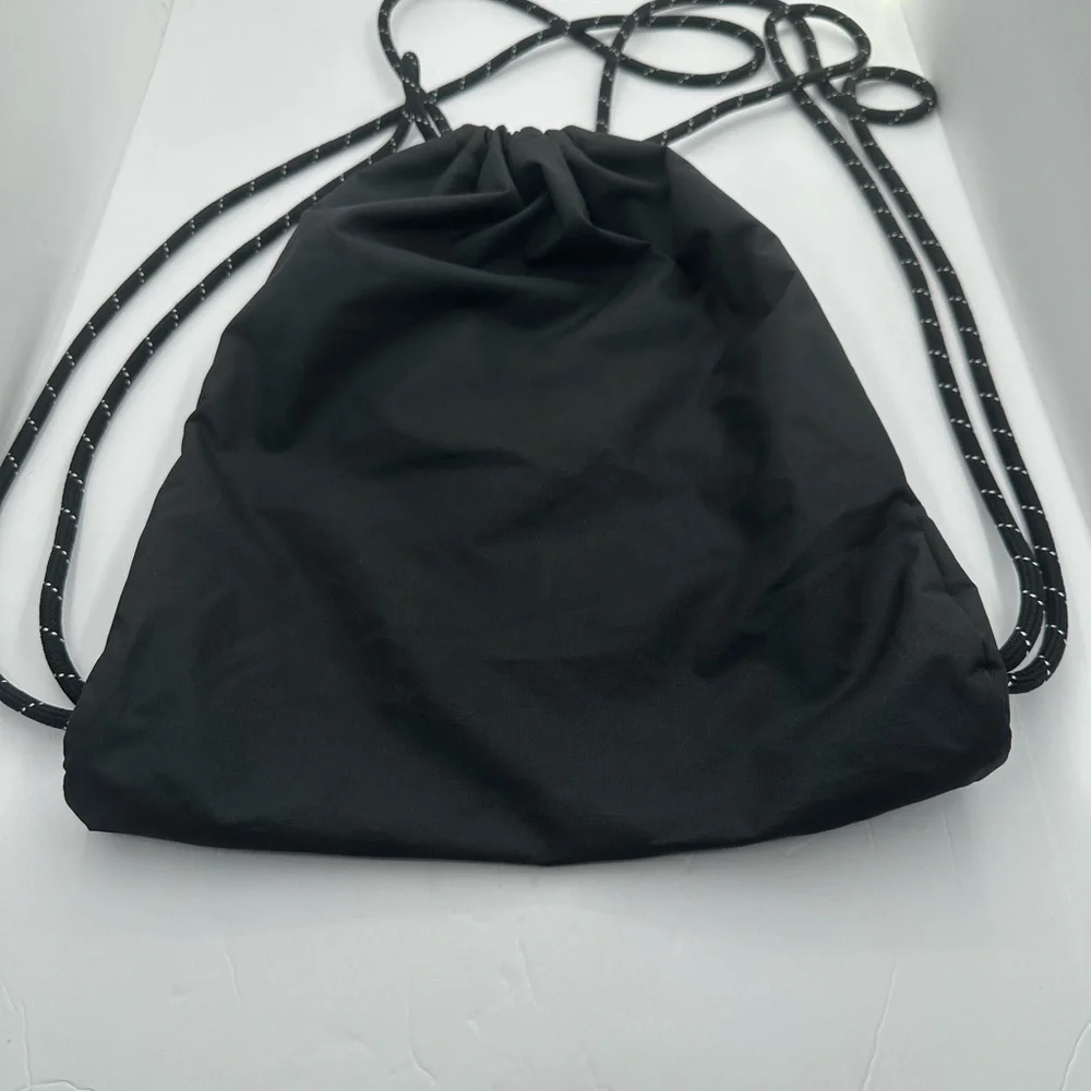 Nike Black Drawstring Sports Sack with White Logo and Red Accent